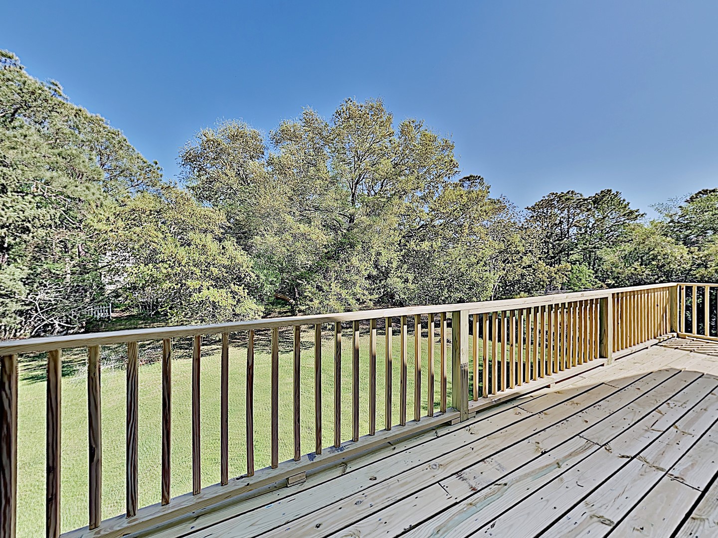 Sundeck overlooks back yard