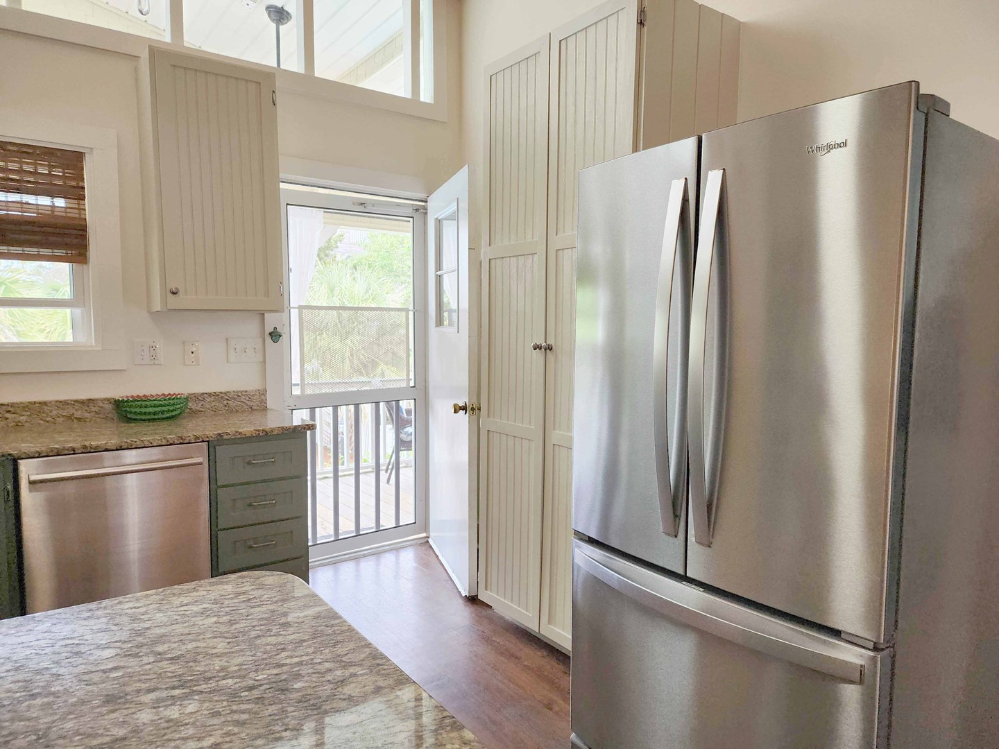 Kitchen Opens To Porch Overlooking Pool