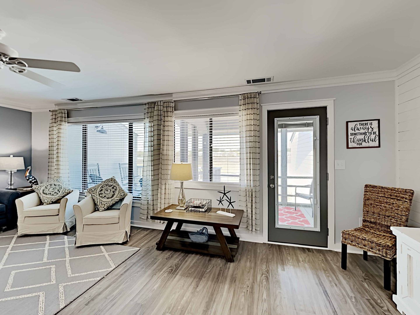 Living Area Opens to Screened Porch and Sun Deck