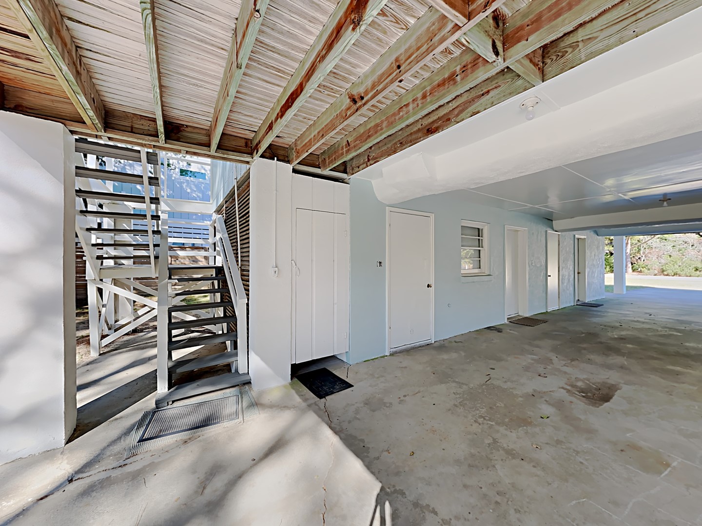 Enclosed Outside Shower and Stairs to Back Porch