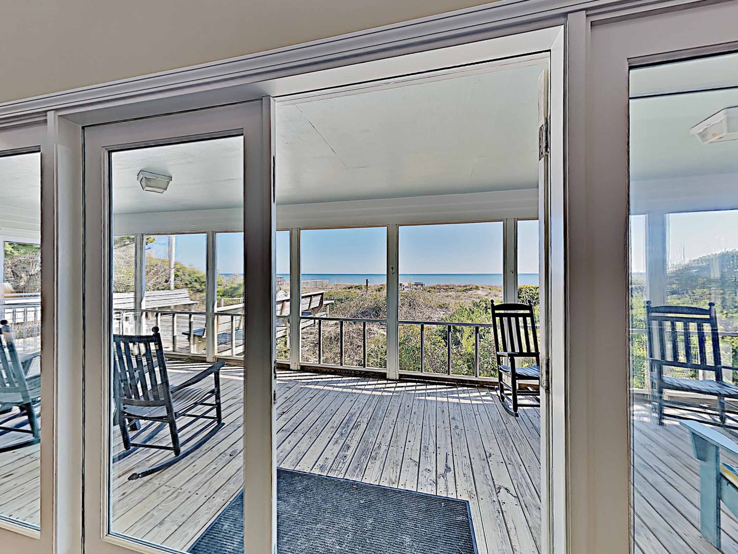 Living Room Opens to Screened Porch