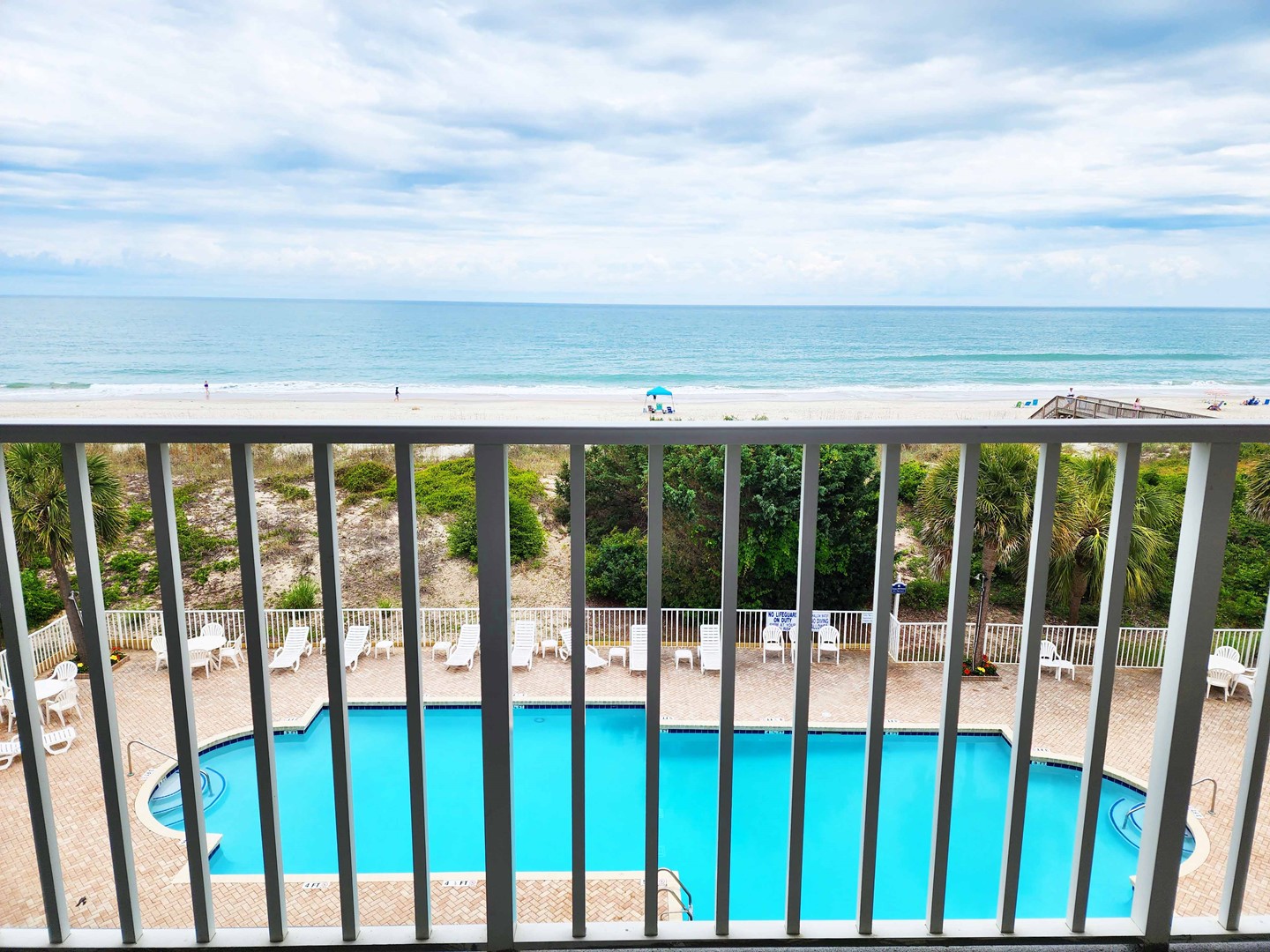 Balcony View to Pool and Ocean