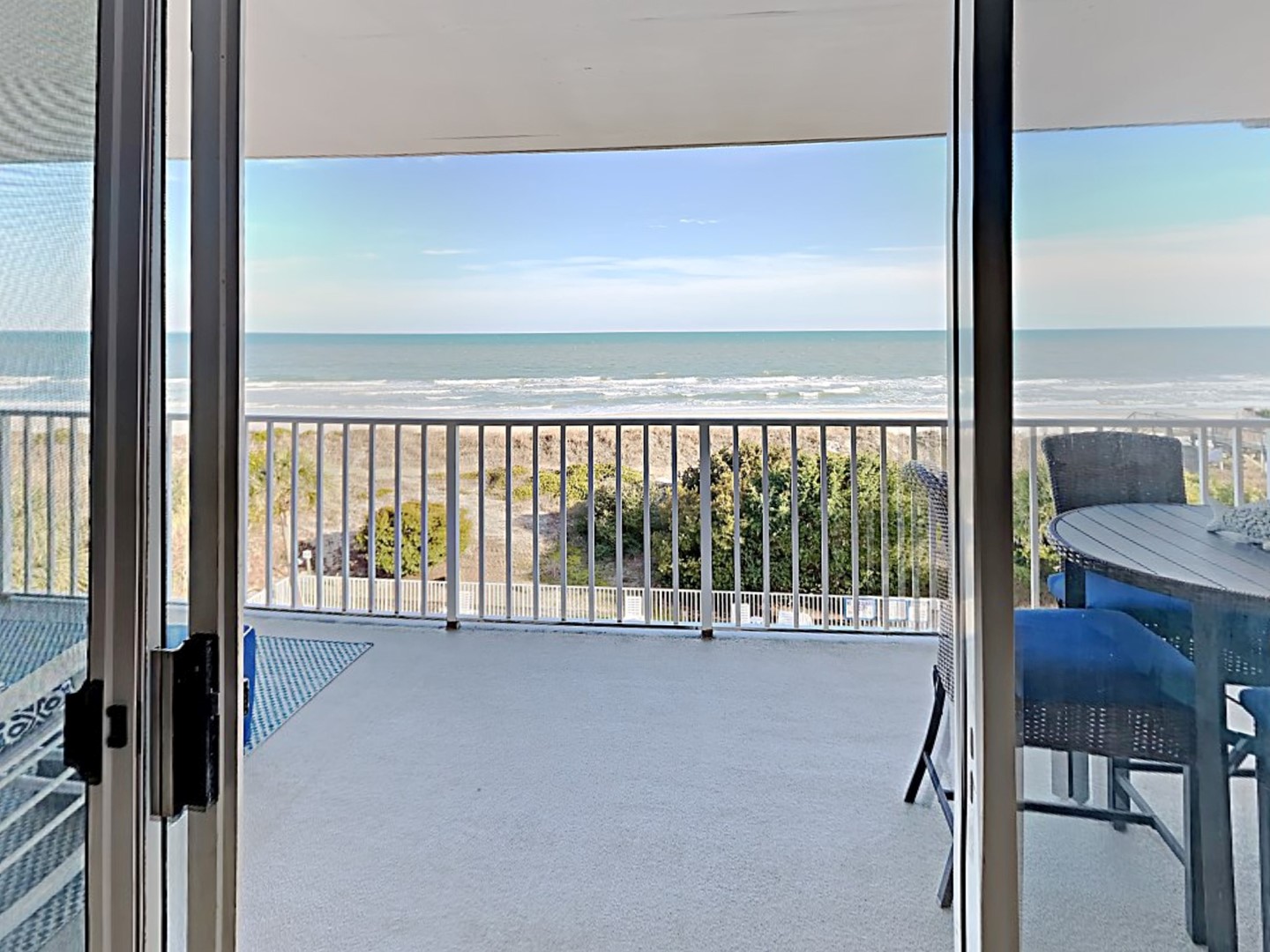 Living Area Opens to Balcony and View