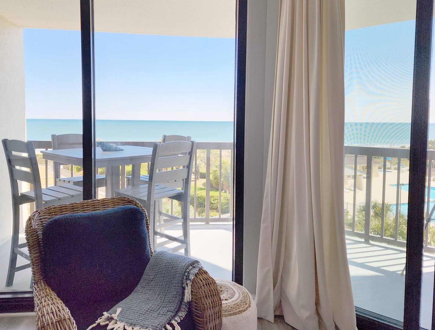 Living Area Opens to Balcony and View