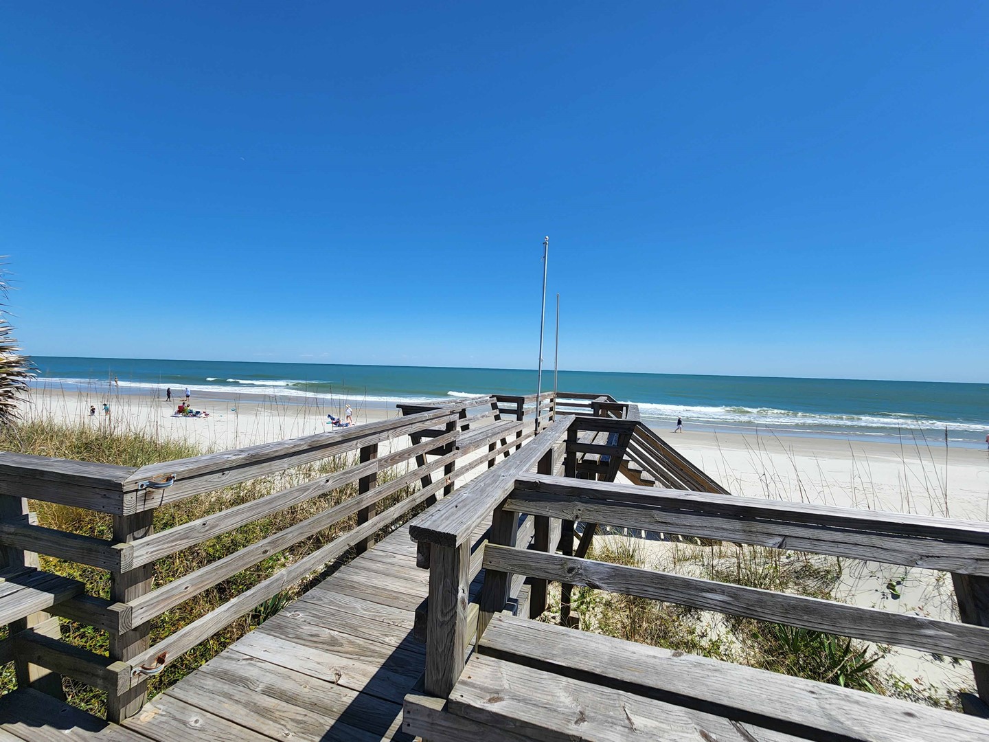 Private Boardwalk to Beach with Bench Seating