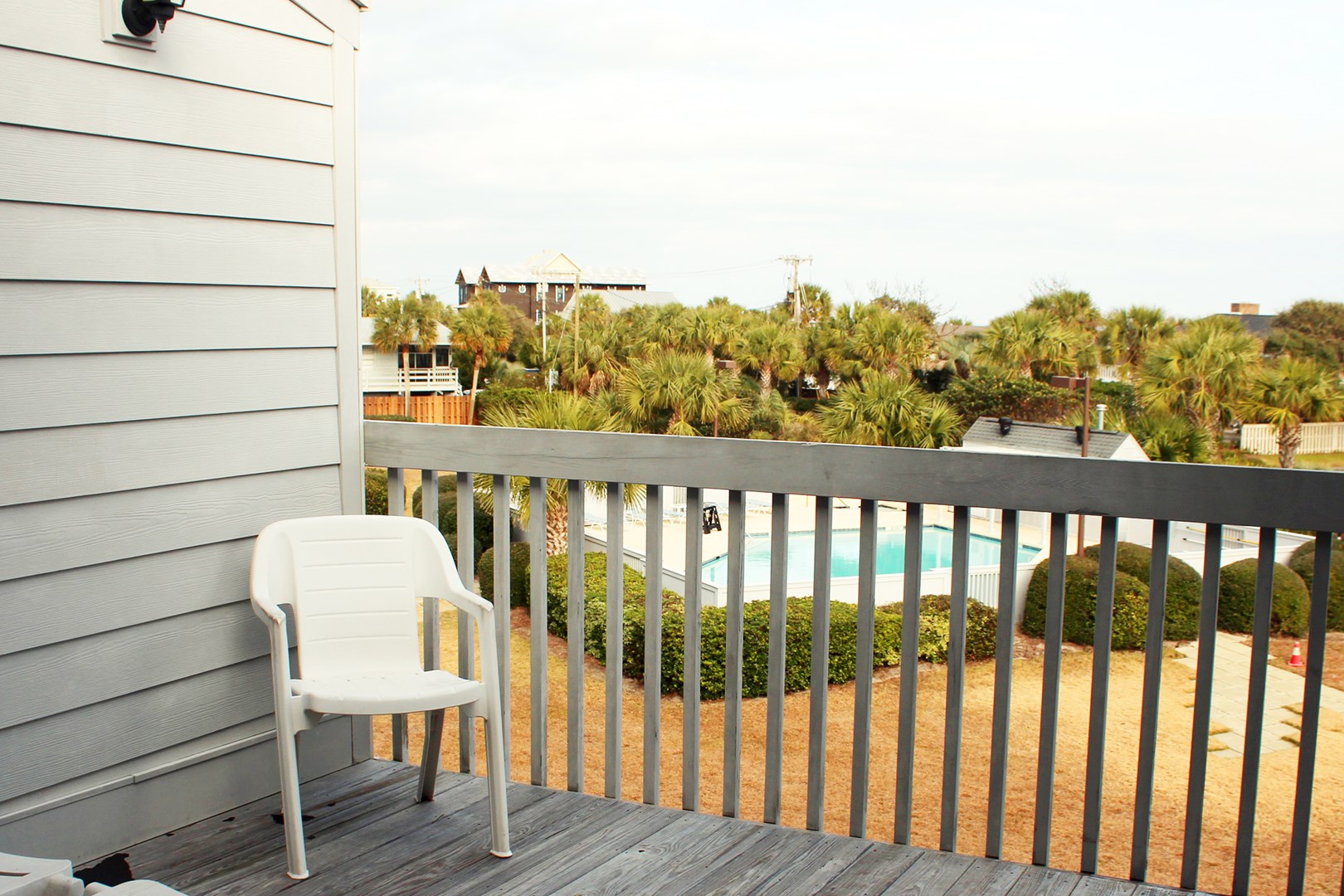 Balcony overlooking swimming pool