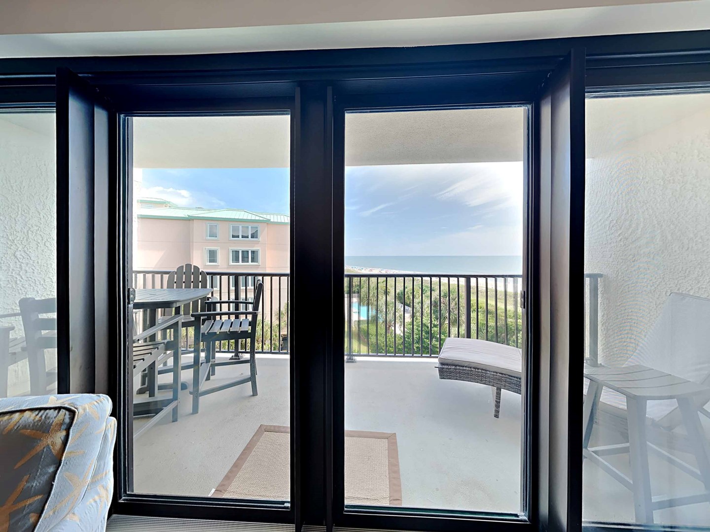 Sliding Glass Doors Open to Balcony