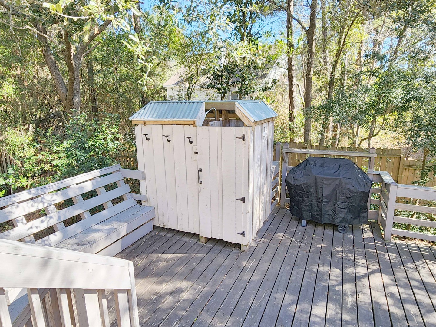 Enclosed Outside Shower and Grill Area