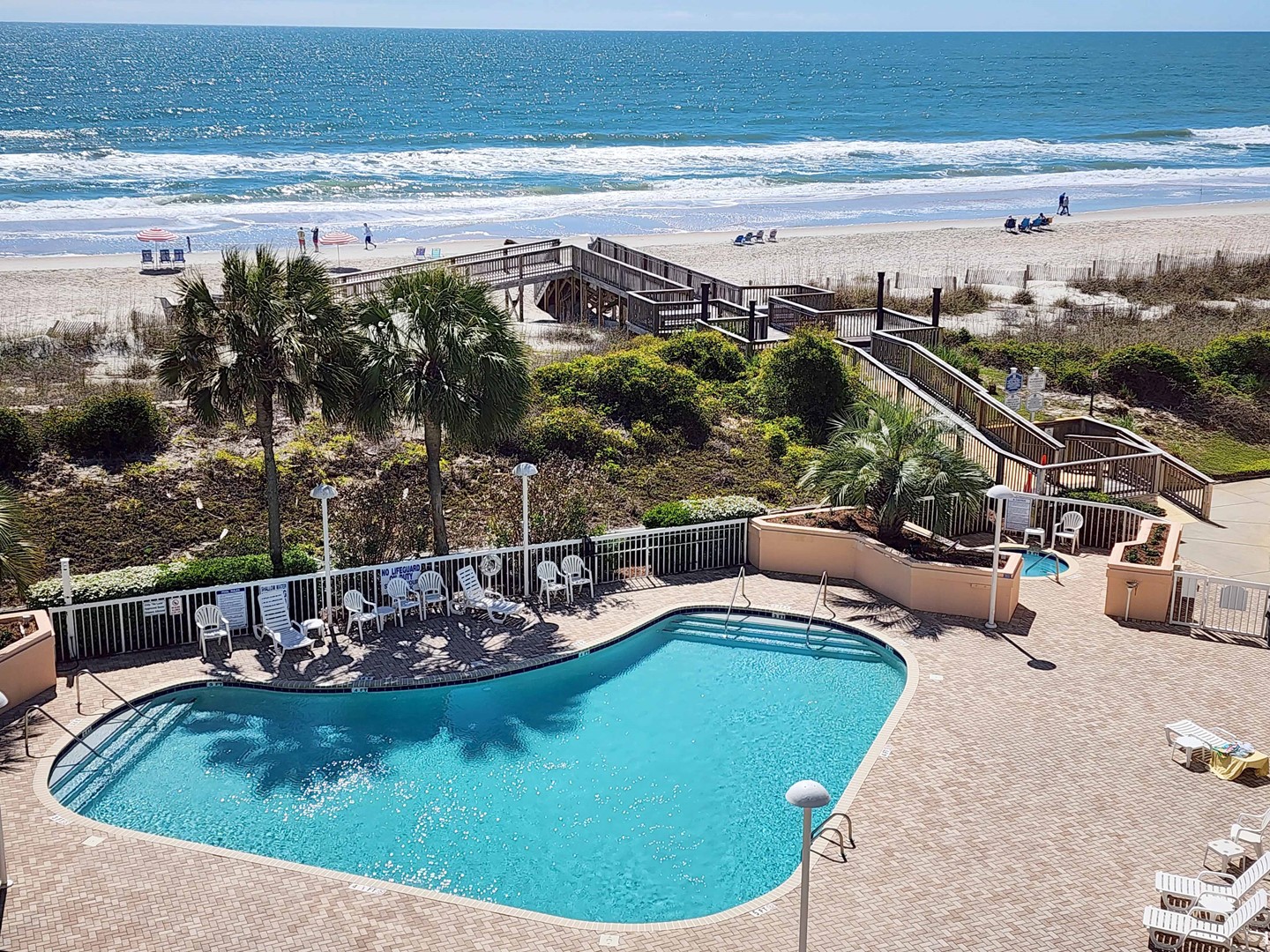 Balcony View to Pool and Ocean
