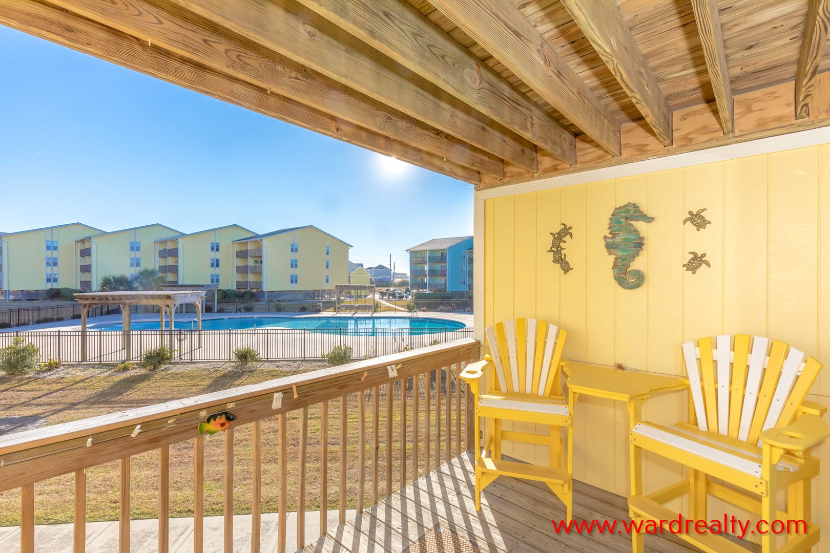 Covered Deck with Pool View